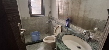 Bathroom in 1 BHK Apartment at Omkar Signet, Malad East – for Rent