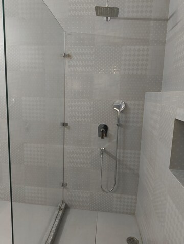 Bathroom in 4 BHK Apartment at Geetanjali Enclave – for Rent