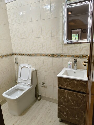 Bathroom in 4 BHK Apartment at Geetanjali Enclave – for Rent
