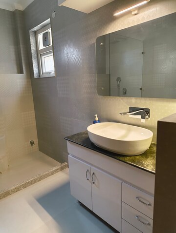 Bathroom in 4 BHK Apartment at Geetanjali Enclave – for Rent