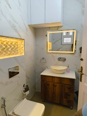Bathroom in 4 BHK Apartment at Geetanjali Enclave – for Rent