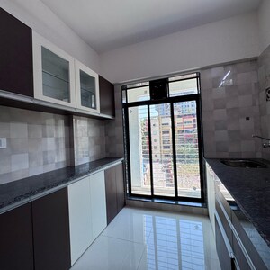 Kitchen in 2 BHK Apartment at Vasai West – for Sale