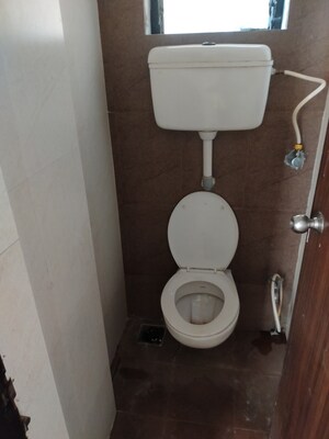 Bathroom in 1 BHK Apartment at Raunak City 3, Kalyan West – for Sale