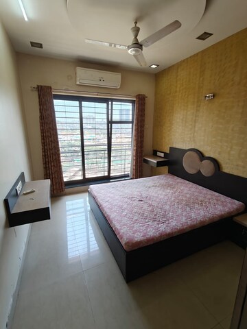 Bedroom in 2 BHK Apartment at K Raheja Heights, Malad East – for Rent