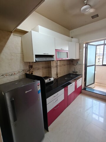 Kitchen in 3 BHK Apartment at K Raheja Heights, Malad East – for Rent