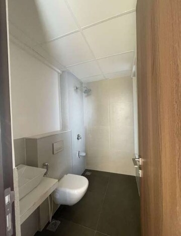 Bathroom in 3 BHK Apartment at Piramal Vaikunth, Balkum Pada – for Rent