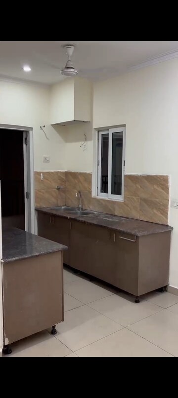 Kitchen in 2 BHK Apartment at Gaurs Cascades, Raj Nagar Extension – for Sale