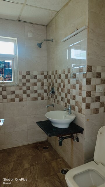 Bathroom in 2.5 BHK Apartment at Apex Athena, Sector 75 – for Sale