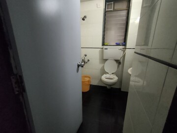 Bathroom in 1 BHK Apartment at Charkop Silver Presidency, Kandivali West – for Sale