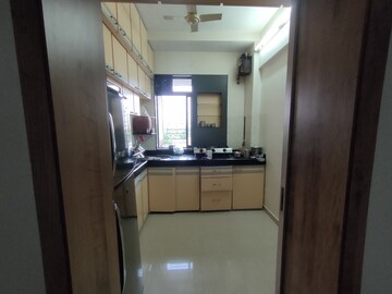 Kitchen in 1 BHK Apartment at Charkop Silver Presidency, Kandivali West – for Sale