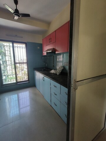 Kitchen in 2 BHK Apartment at Paradise Sai World Empire, Kharghar – for Rent