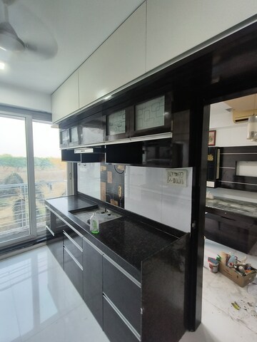 Kitchen in 4 BHK Apartment at Paradise Sai World Empire, Kharghar – for Rent