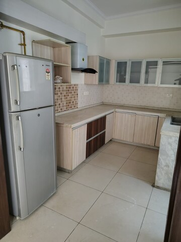 Kitchen in 4 BHK Apartment at Mahagun Mezzaria, Sector 78 – for Rent