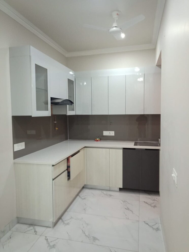 Kitchen, central-park-cerise-suites 2.5 Bedroom 1210 Sq.Ft. Builder Floor In Sohna Sector 33 Gurgaon 8665182