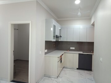 Kitchen in 2.5 BHK Builder Floor at Central Park Cerise Suites, Sohna Sector 33 – for Rent