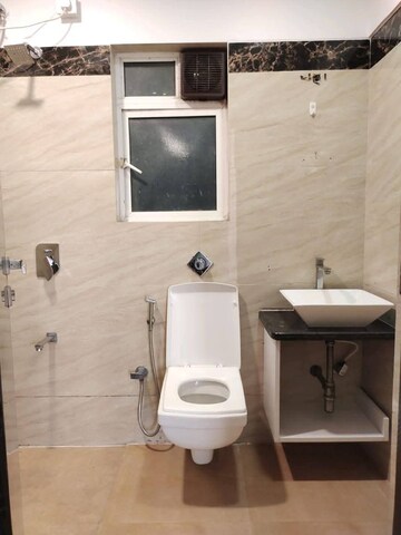Bathroom in 2 BHK Apartment at Millionaire Heritage, Andheri West – for Rent