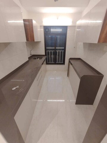 Kitchen in 2 BHK Apartment at Chaitanya Anand Lunkhod CHSL, Andheri West – for Rent