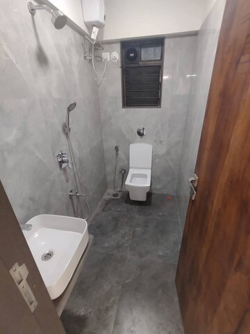 Bathroom in 2 BHK Apartment at Chaitanya Anand Lunkhod CHSL, Andheri West – for Rent