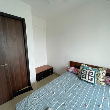 Bedroom in 2 BHK Apartment at Wadhwa Atmosphere O2, Nahur Gaothan – for Rent