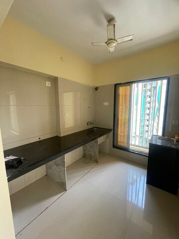 Kitchen in 1 BHK Apartment at Unique Signature Mumbai, Mira Road – for Rent
