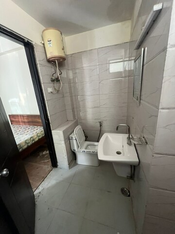 Bathroom in 3 BHK Apartment at Eros Grand Mansions, South City 2 – for Rent