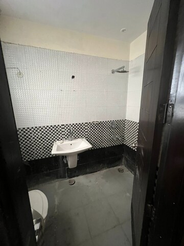Bathroom in 3 BHK Apartment at Eros Grand Mansions, South City 2 – for Rent