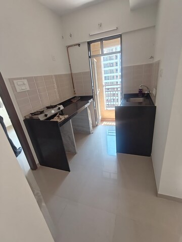 Kitchen in 1 BHK Apartment at JP North Aviva, Mira Road – for Rent