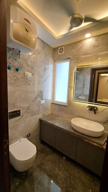Bathroom in 4 BHK Builder Floor at Ansal Sushant Lok I, Sector 43 – for Rent