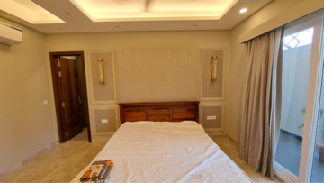 Bedroom in 4 BHK Builder Floor at Ansal Sushant Lok I, Sector 43 – for Rent
