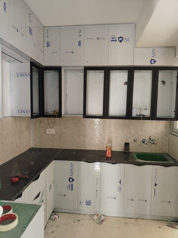 Kitchen in 2 BHK Apartment at Signature The Millennia 2, Sector 37d – for Rent