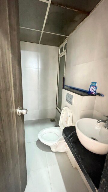 Bathroom in 1 BHK Apartment at JP North Celeste, Mira Road – for Rent