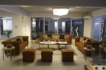 Living Room in 3 BHK Apartment at Malwa Escon Primera, International Airport Road – for Sale