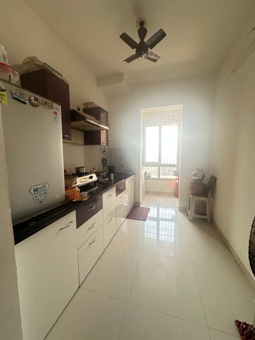 Kitchen in 2 BHK Apartment at Puranik Rumah Bali, Ghodbunder Road – for Rent