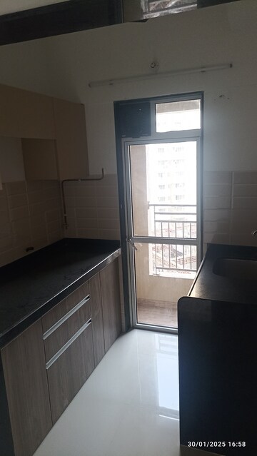 Kitchen in 1 BHK Apartment at DB Orchid Ozone, Dahisar East – for Rent