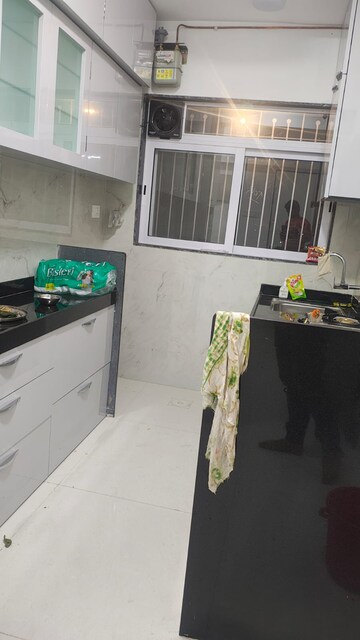 Kitchen in 2 BHK Apartment at Ameya Eastern Heights CHS, Chunabhatti – for Rent