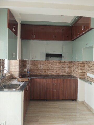 Kitchen in 2 BHK Apartment at Amrapali Tropical Garden, Tech Zone 4 Greater Noida – for Rent