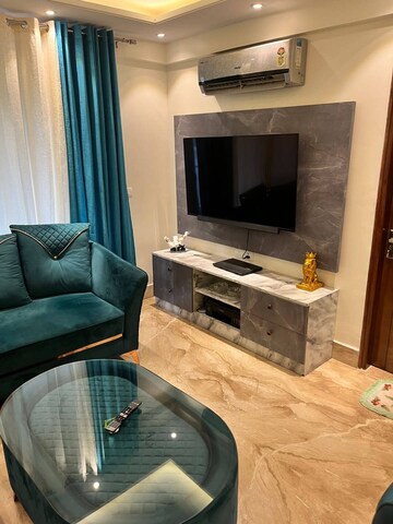 Living Room in 1 RK Builder Floor at Enkay Towers, Sector 19 – for Rent