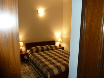 Bedroom in 3 BHK Apartment at Boutique Residential Apartments C-253, Defence Colony – for Rent