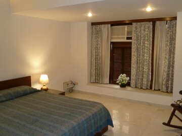 Bedroom in 3 BHK Apartment at Boutique Residential Apartments C-253, Defence Colony – for Rent