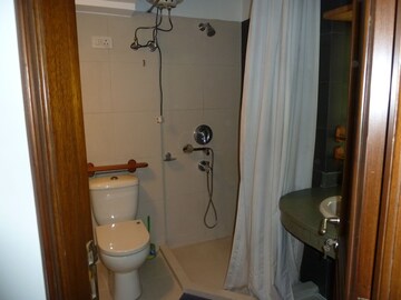 Bathroom in 3 BHK Apartment at Boutique Residential Apartments C-253, Defence Colony – for Rent