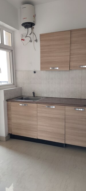 Kitchen in 3 BHK Apartment at ATS Dolce, Zeta I Greater Noida – for Rent