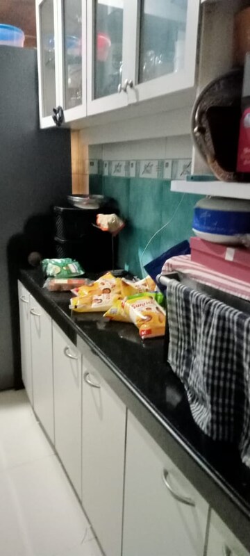Kitchen in 2 BHK Apartment at Vasant Sarita, Kandivali East – for Sale