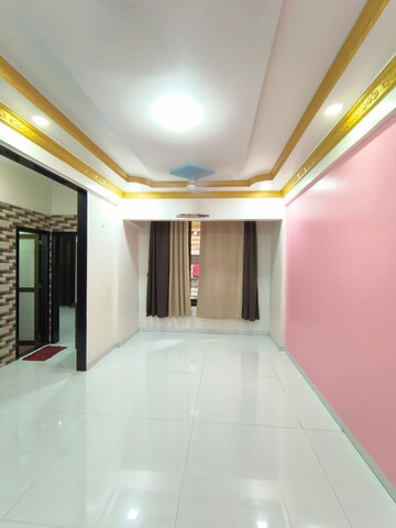Living Room in 2 BHK Apartment at Seawoods Sector 42 – for Rent