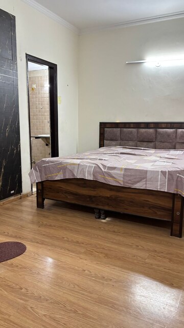 Bedroom in 2 BHK Apartment at Aims Golf City, Sector 75 – for Rent