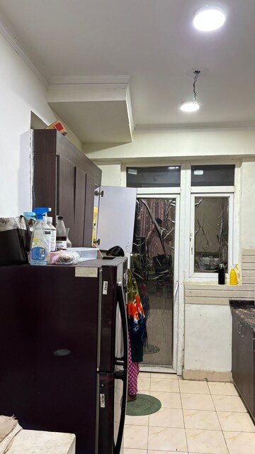 Kitchen in 2 BHK Apartment at Aims Golf City, Sector 75 – for Rent