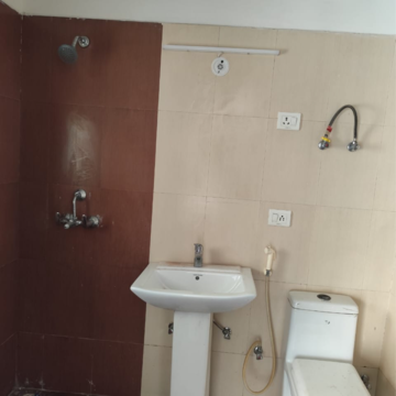 Bathroom in 3 BHK Apartment at Gardenia Golf City, Noida Central – for Rent
