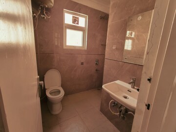 Bathroom in 3 BHK Apartment at Dilshad Garden – for Sale
