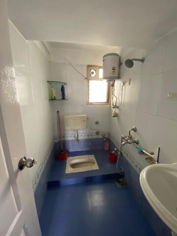 Bathroom in 2.5 BHK Apartment at Runwal Garden City, Balkum Pada – for Rent