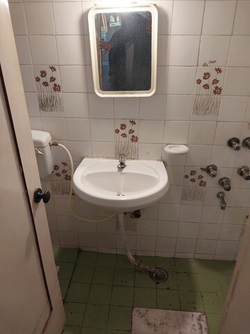 Bathroom in 1 BHK Apartment at Lokhandwala Complex – for Rent