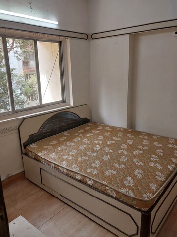 Bedroom in 1 BHK Apartment at Lokhandwala Complex – for Rent